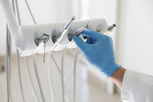 Professional Emergency Dentist technician working in Scottdale, GA